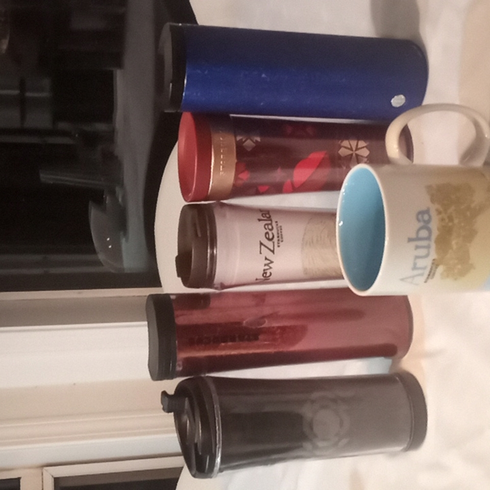 Starbucks travel mugs and mug